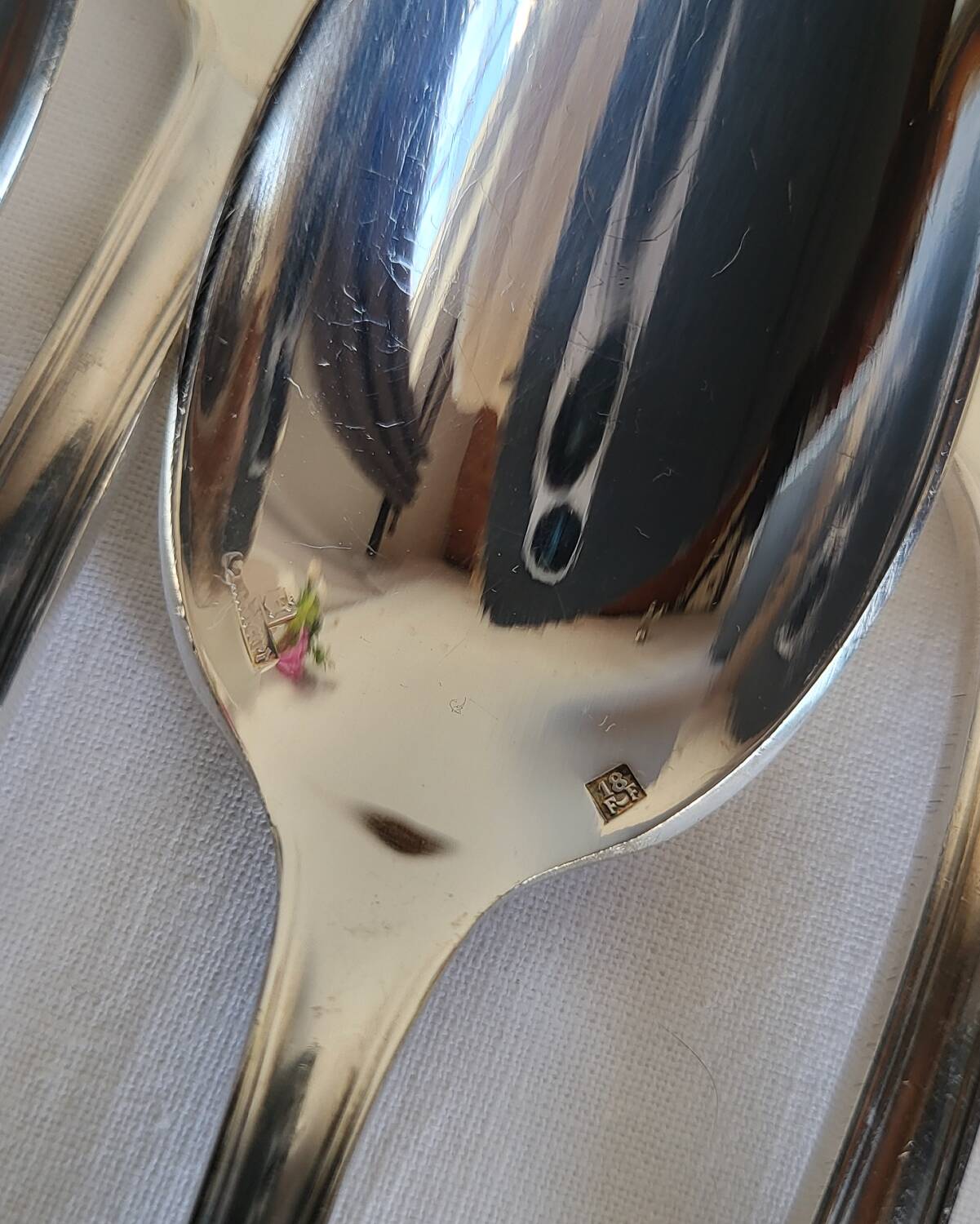 12 small silver-plated metal spoons by Guildart