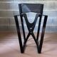 Shiny black folding chair Regista