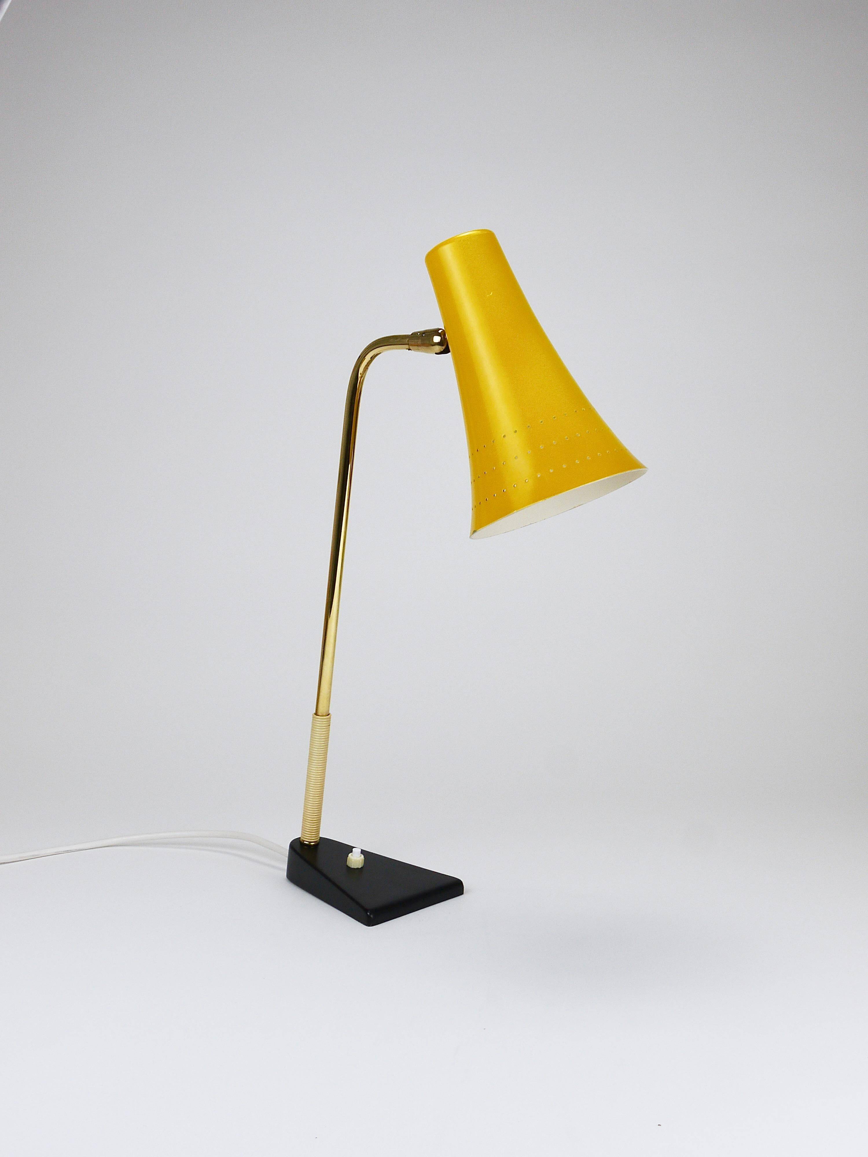 Yellow desk, table or accent lamp by J.T. Kalmar, brass and iron, Vienna, Austria, 1950s.