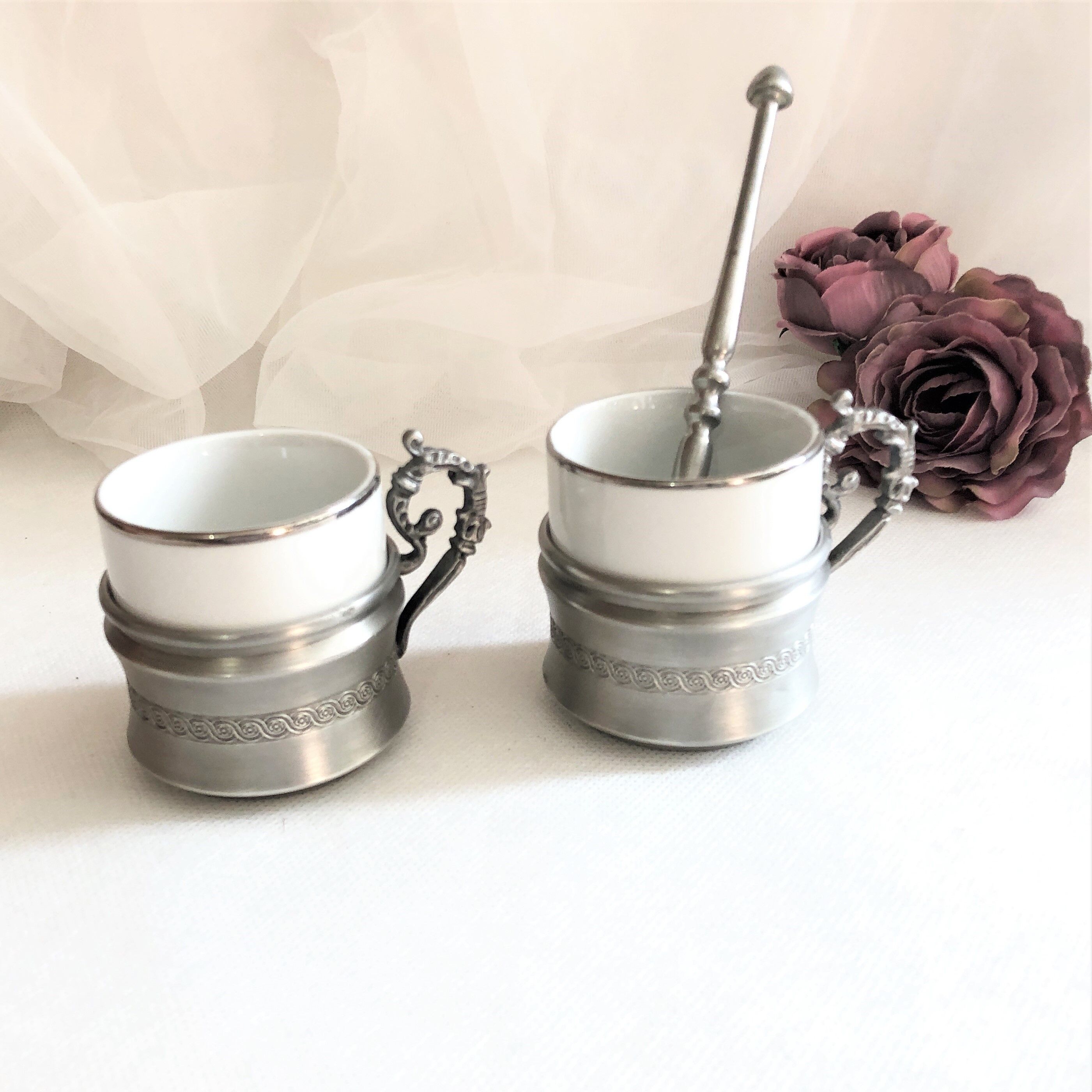Set two porcelain cups with pewter support