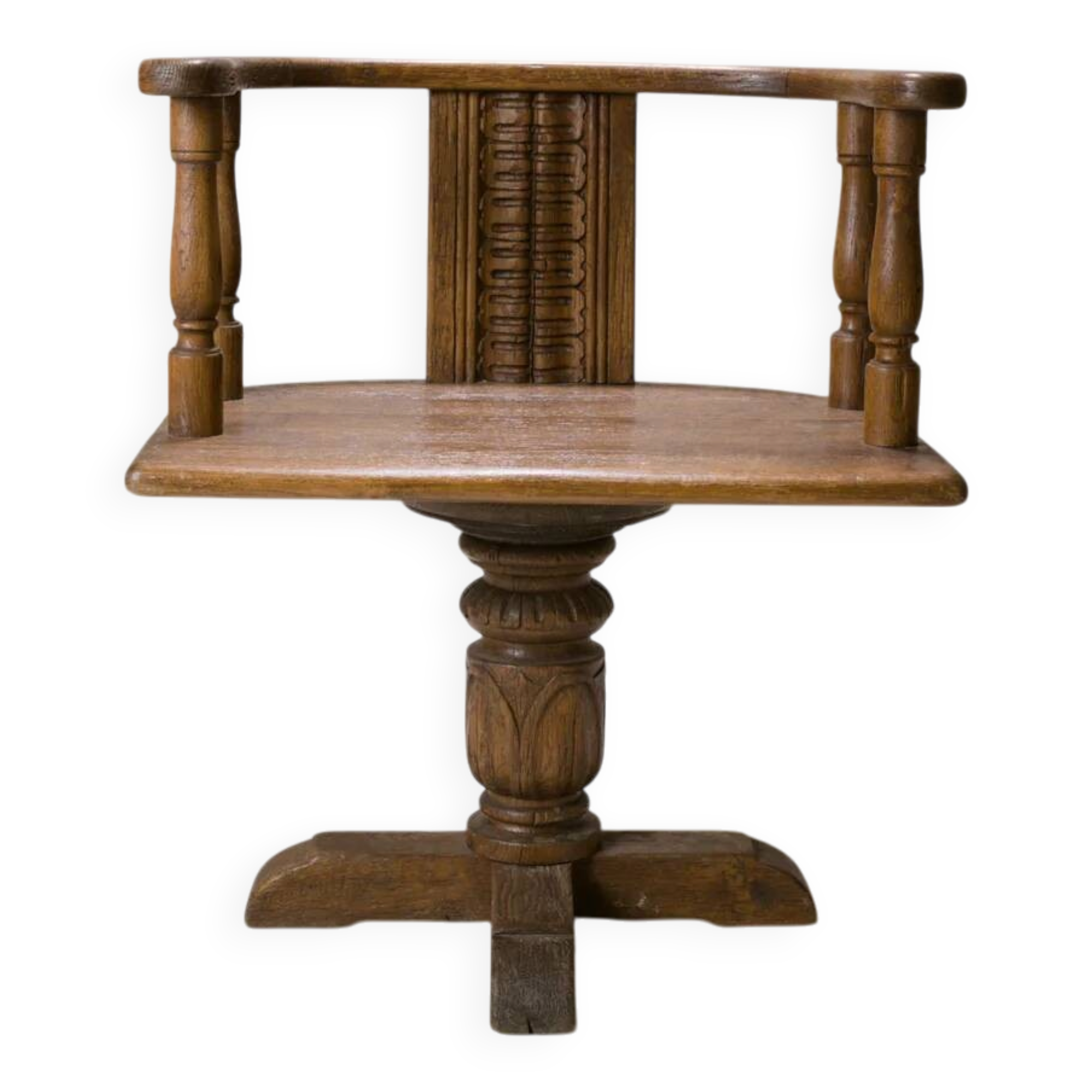 Swivel armchair in carved oak with ball bearings, early 20th century.