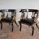 Pair of Empire-style bergère armchairs decorated with swans and lyres