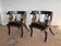 Pair of Empire style bergère armchairs with decorations of swans and lyres.