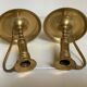 Pair of brass cellar rat candlesticks