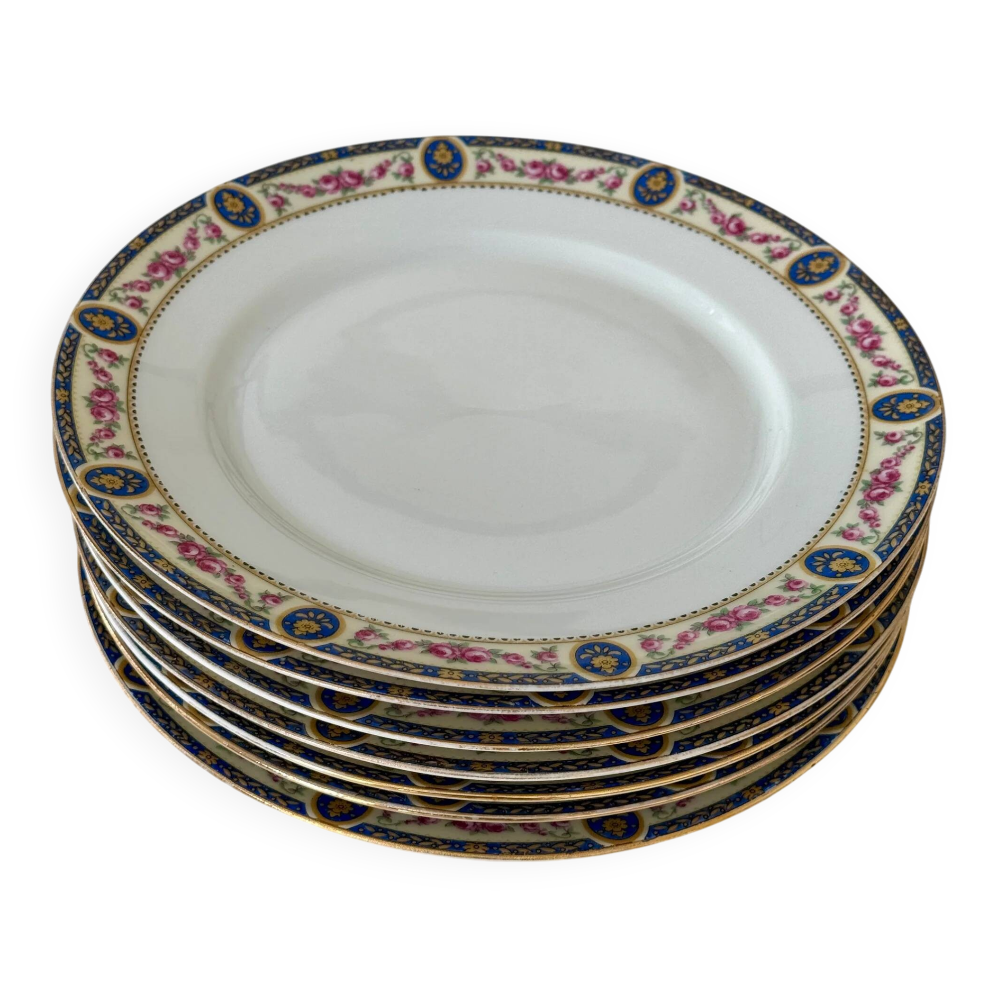 Set of 7 flat plates in Limoges porcelain
