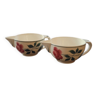 Pair of hand-painted floral-decorated jugs