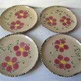 Set of 4 old large glazed ceramic flat plates with flower decor