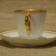 Old white and gold porcelain mocha cup marked souvenir