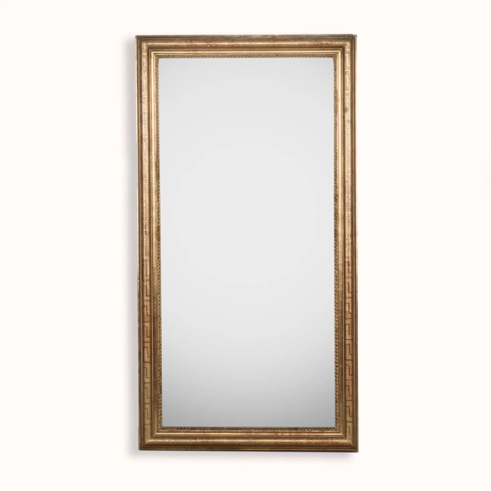 Nineteenth-century rectangular mirror with geometric pattern.