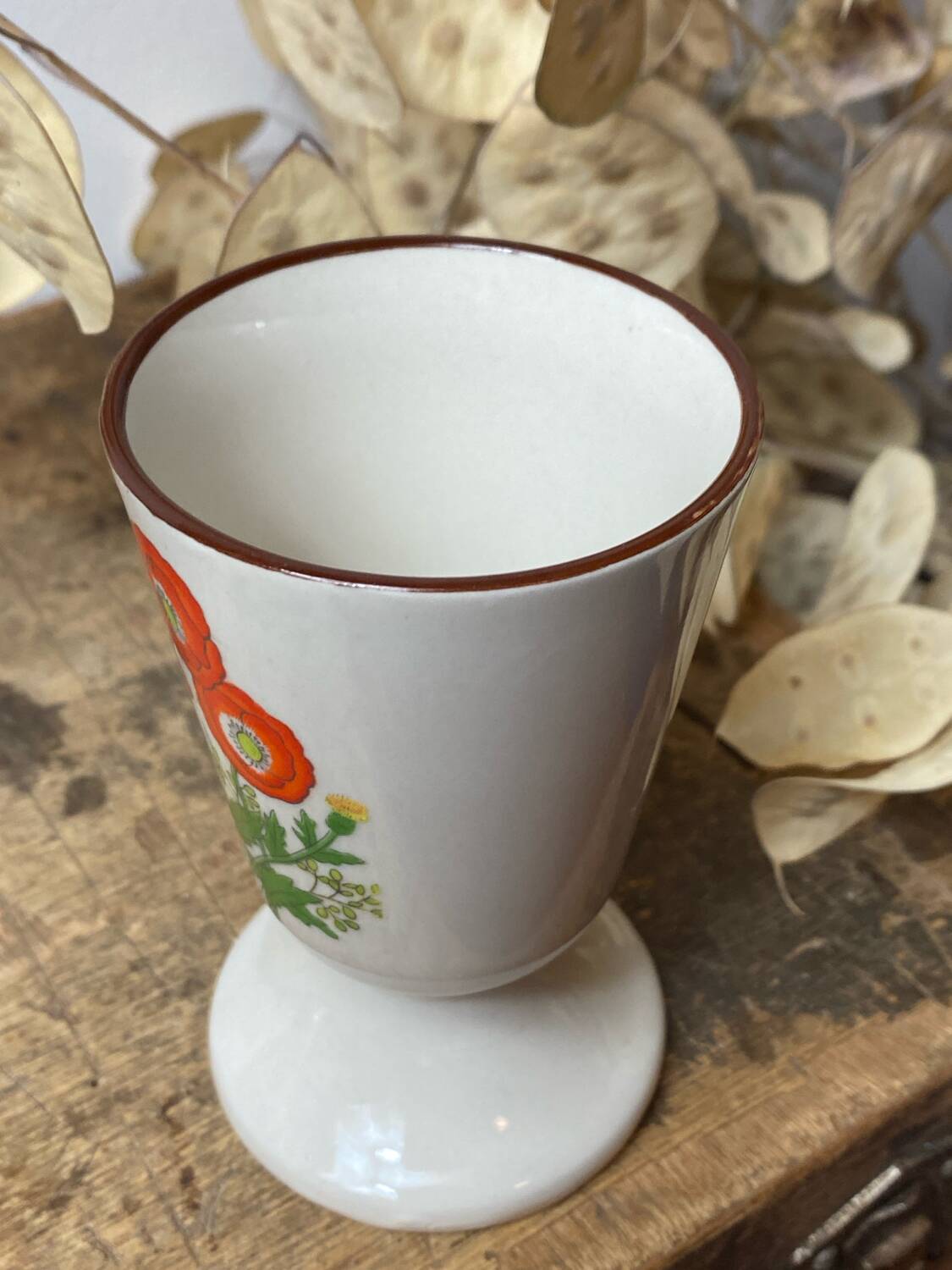 Pair of stoneware mazagrans, poppy decoration
