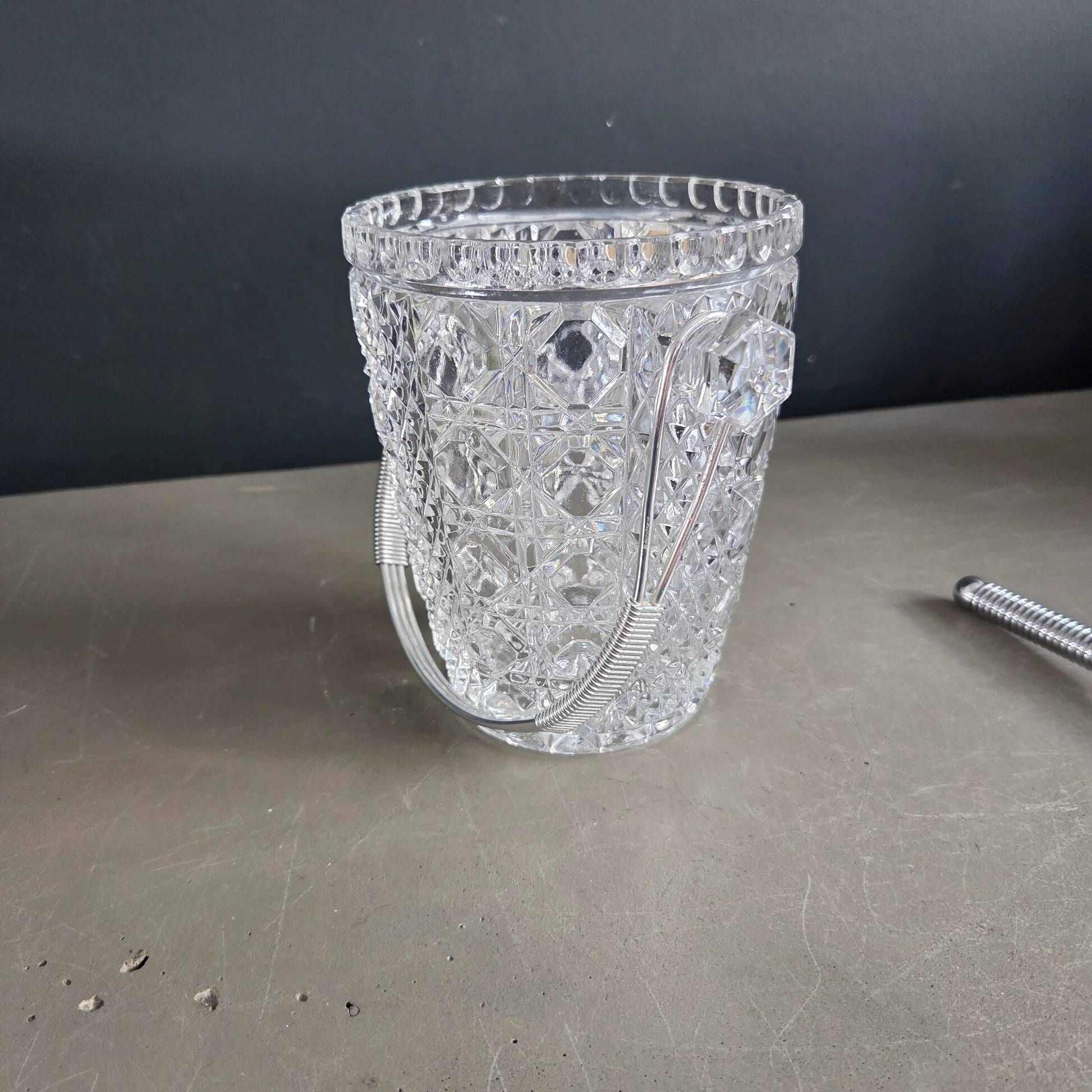 Crystal ice bucket from Bavaria with ice scoop.