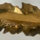 Vintage solid bronze leaf pocket emptier