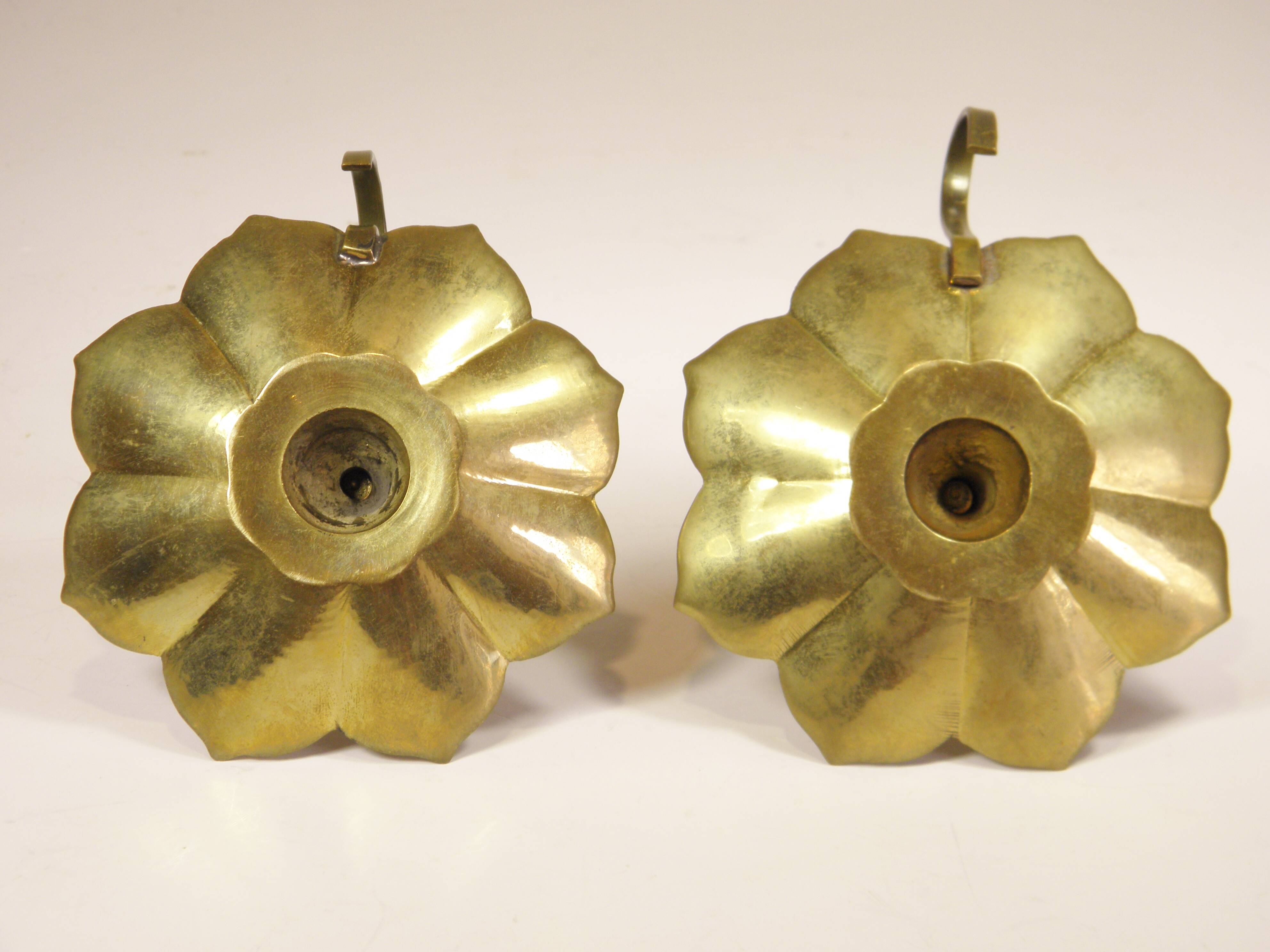 Pair of brass "flower" candlesticks