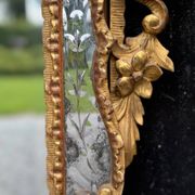 Louis XV style mirror with parecloses in gilded wood, early 19th century, Empire A