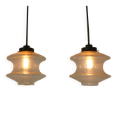 Set of two glass pendant lighting designed by Raak Holland