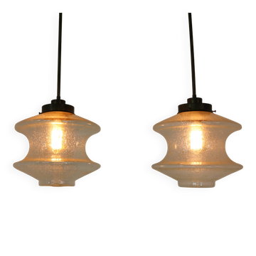 Set of two glass pendant lighting designed by Raak Holland