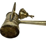 Brass dallah coffee pot with bird-shaped finial, 20th century.