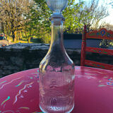 Bouteille en verre ciselé