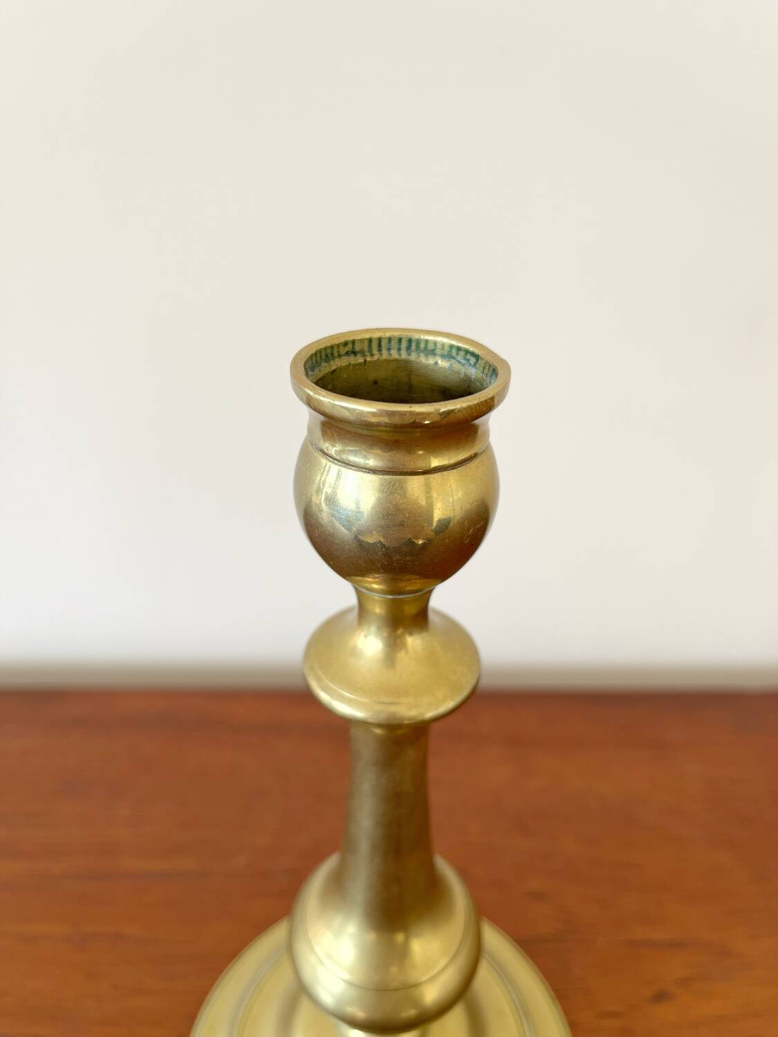 Vintage baluster-shaped antique brass candlestick