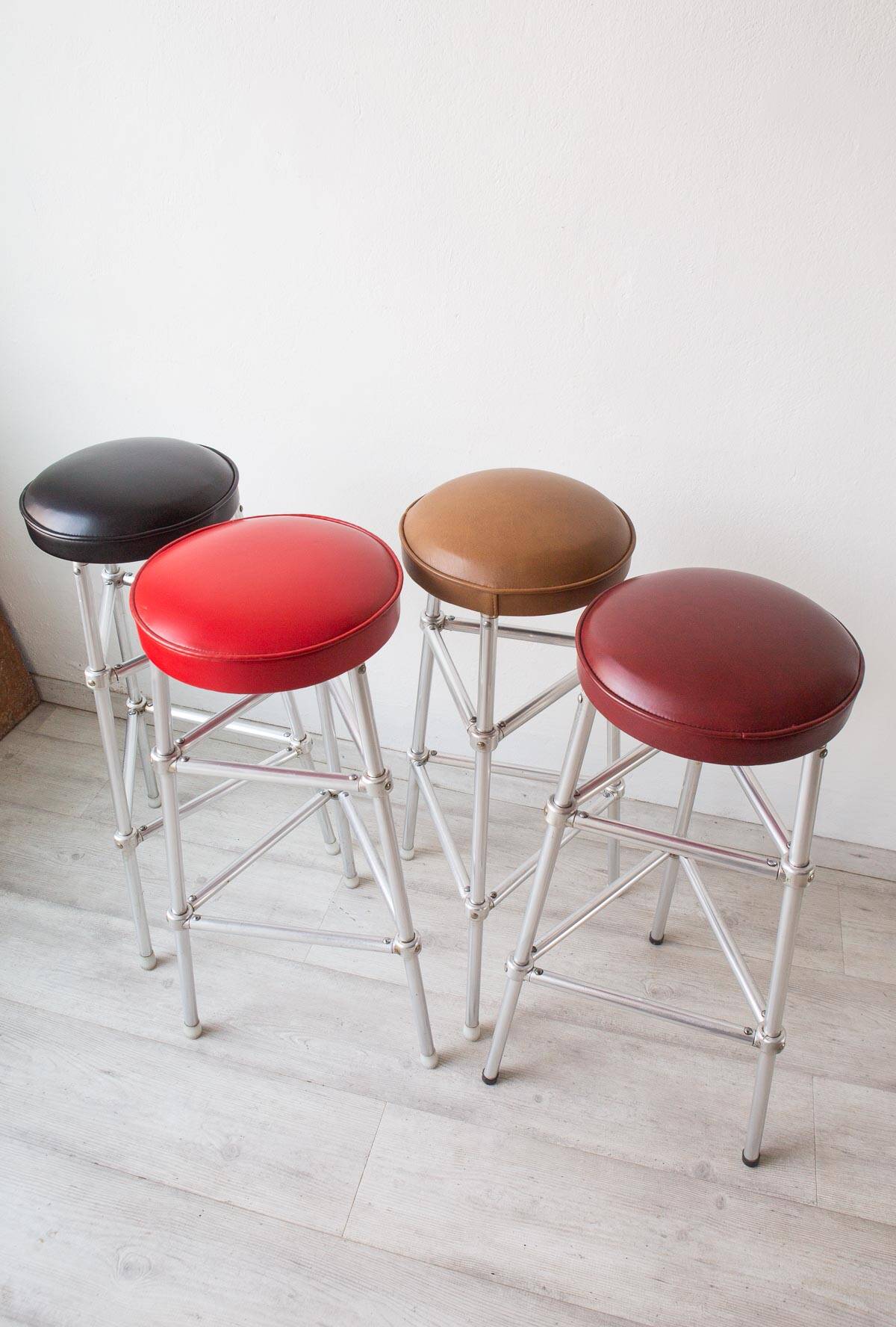 Set of 4 bar stools in aluminum and colored leatherette circa 1980