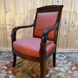 Empire period armchair in mahogany with saber legs.