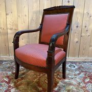 Fauteuil époque Empire en acajou pieds sabres