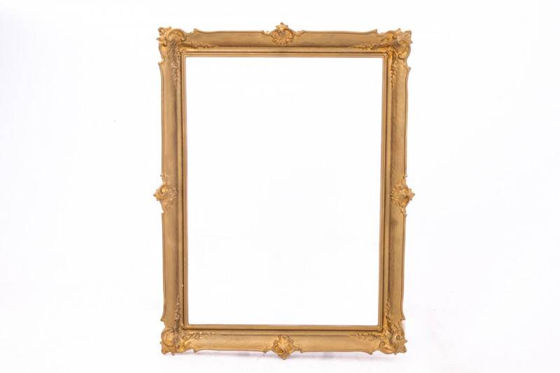 Large French mirror in a gold frame.