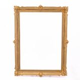 Large French mirror in a gold frame.