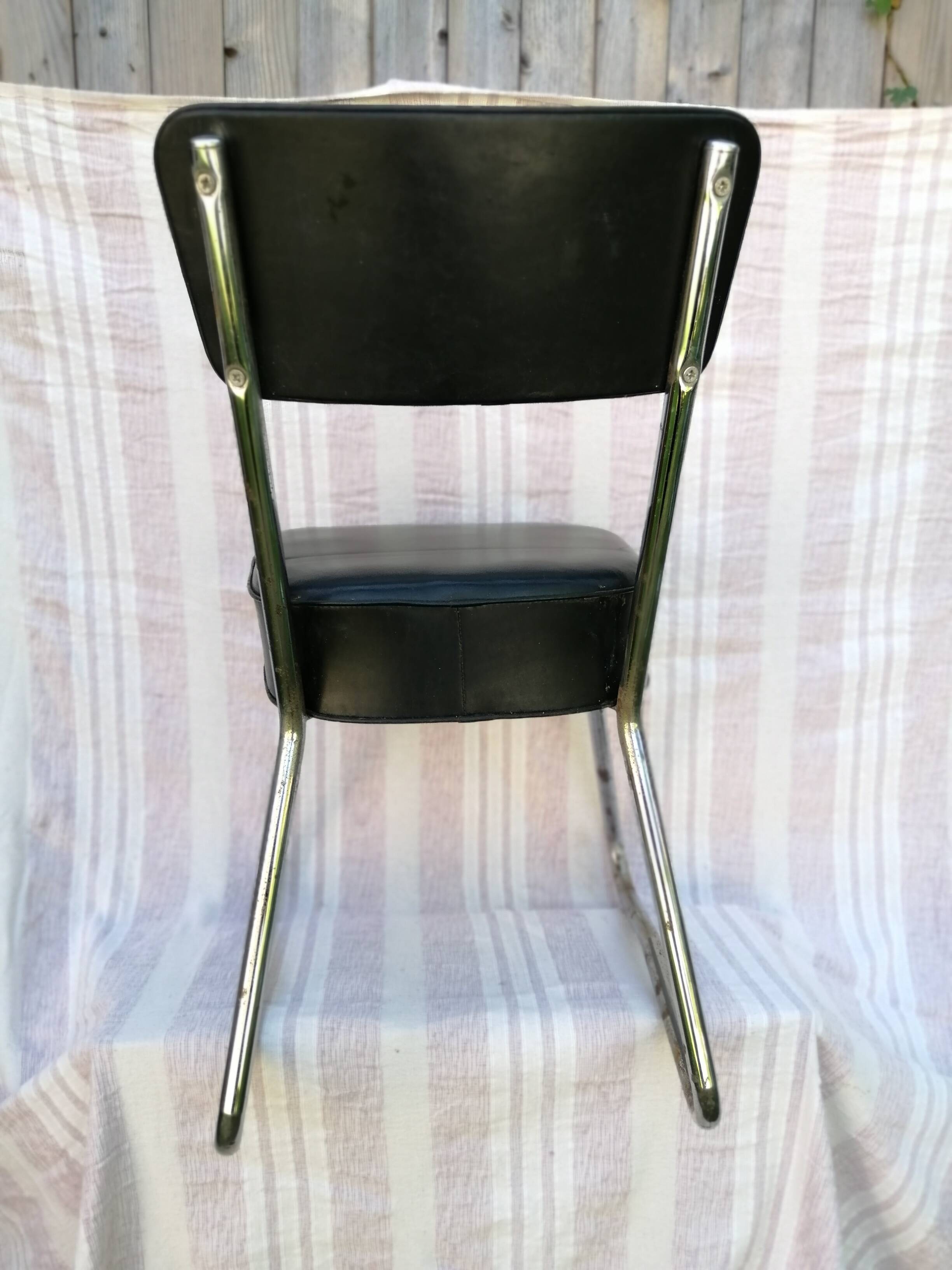 Chrome and skai industrial chair