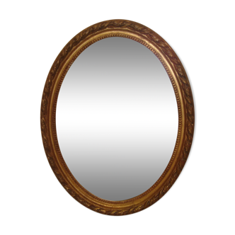 Early 20th century gilded wooden oval mirror - 45x35cm
