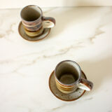 Pair of stoneware cups and sub-cups