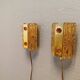 A pair of wall lights with brass-colored suspension with thick pressed glass. Vitrika, Denmark