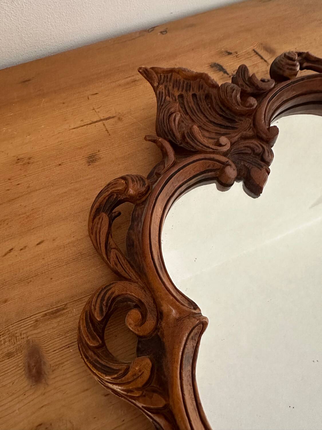 Carved wooden mirror