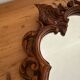 Carved wooden mirror