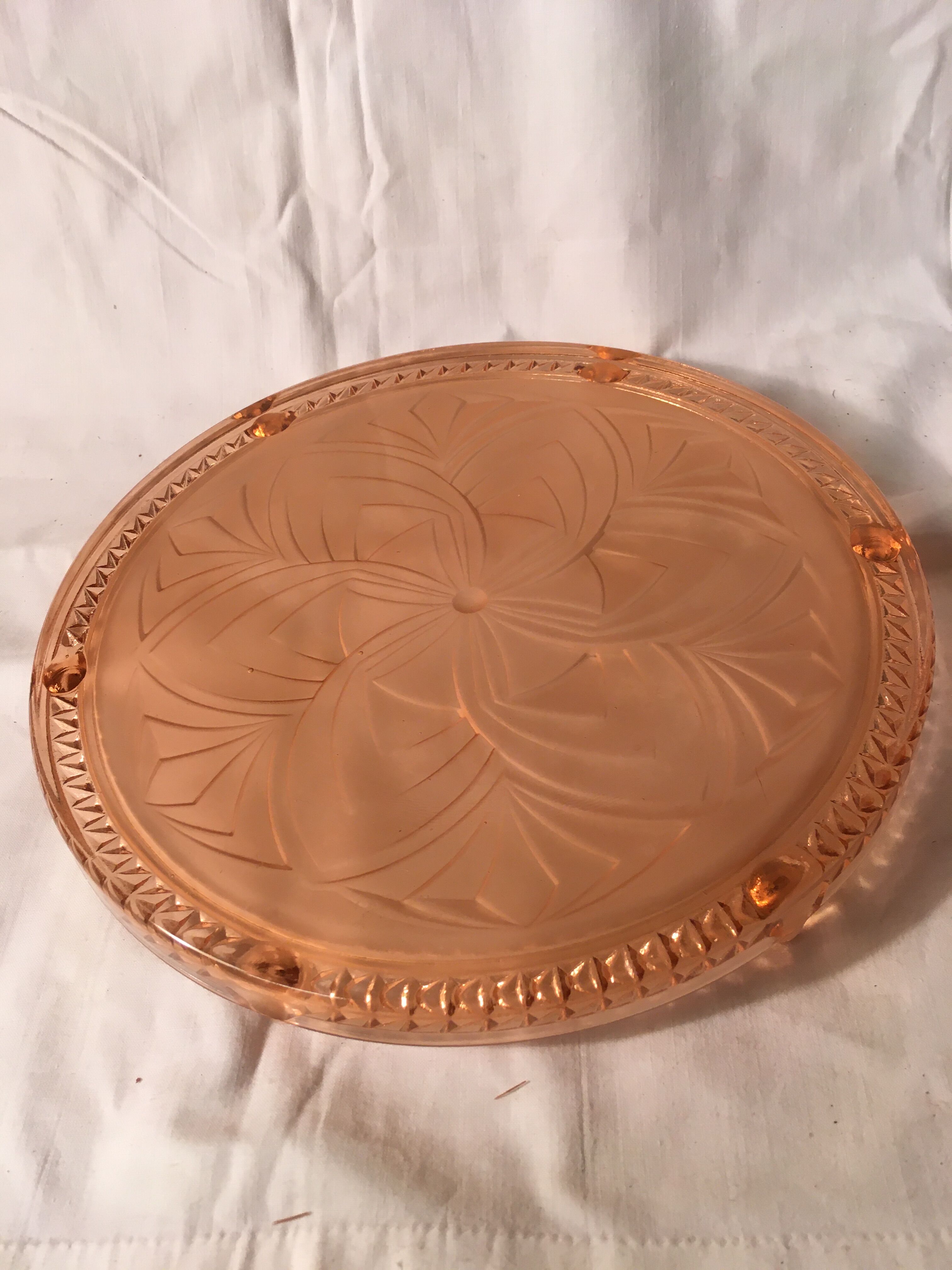 Pink moulded glass dish underside
