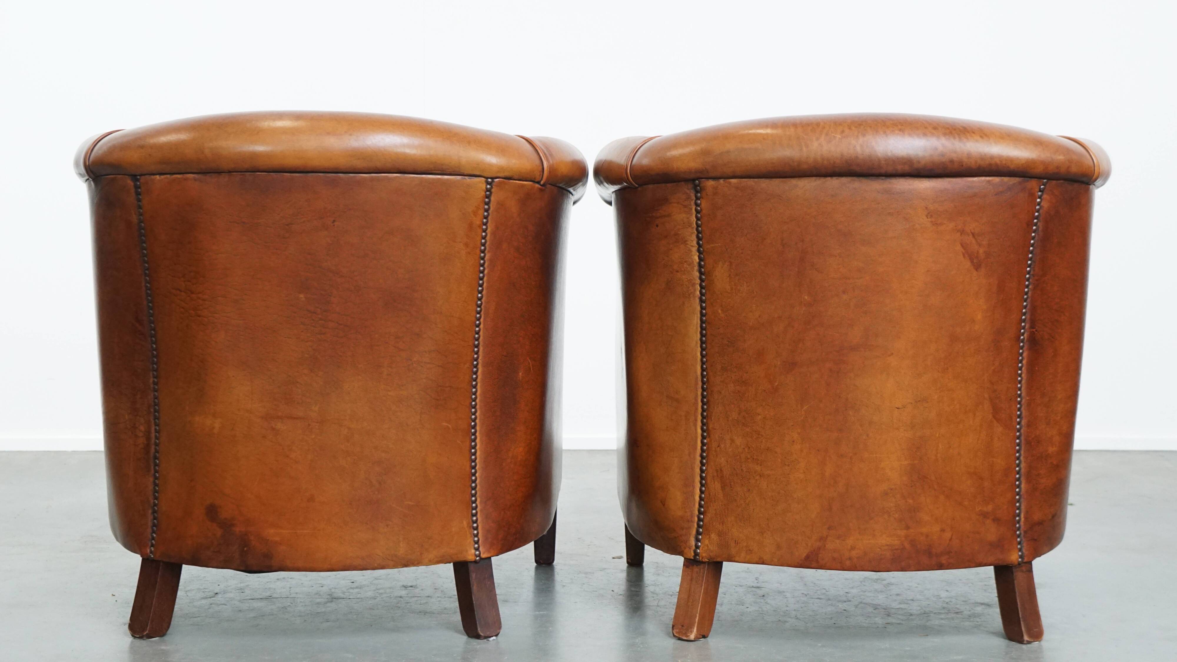 Set of 2 sheepskin leather club chairs