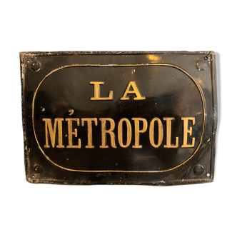 Ancienne plaque " la metropole "