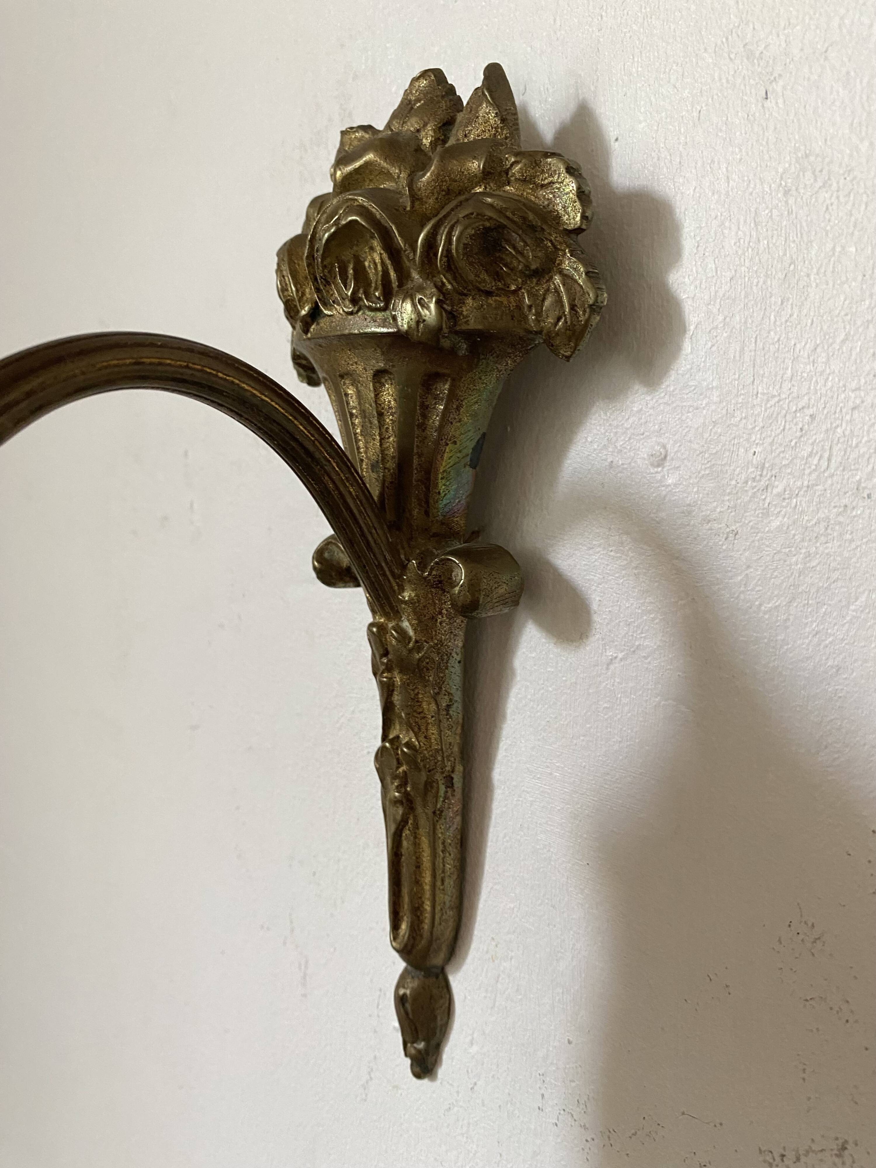 Antique bronze and glass paste wall light