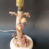 Goebel design Hummel ceramic lamp base with child on an apple tree, 1960s