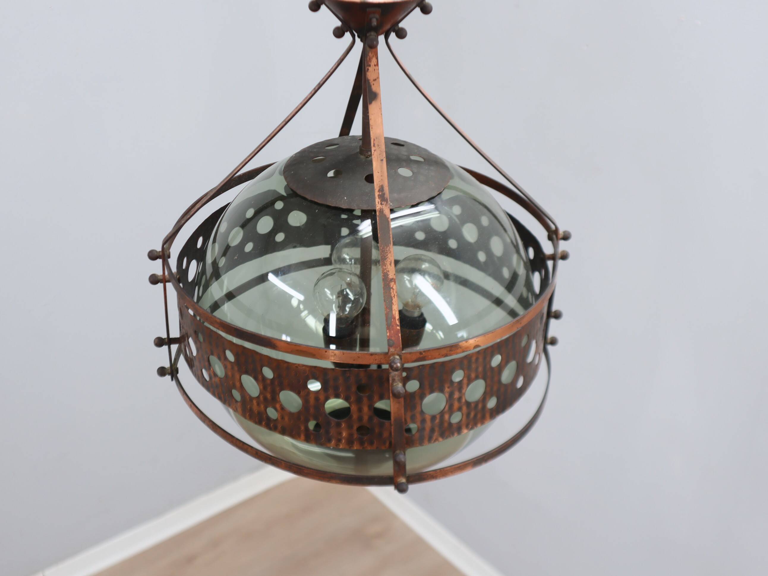 Pair of 1970s Brutalist Copper and Blown Glass Green Bottle Pendant Lamps