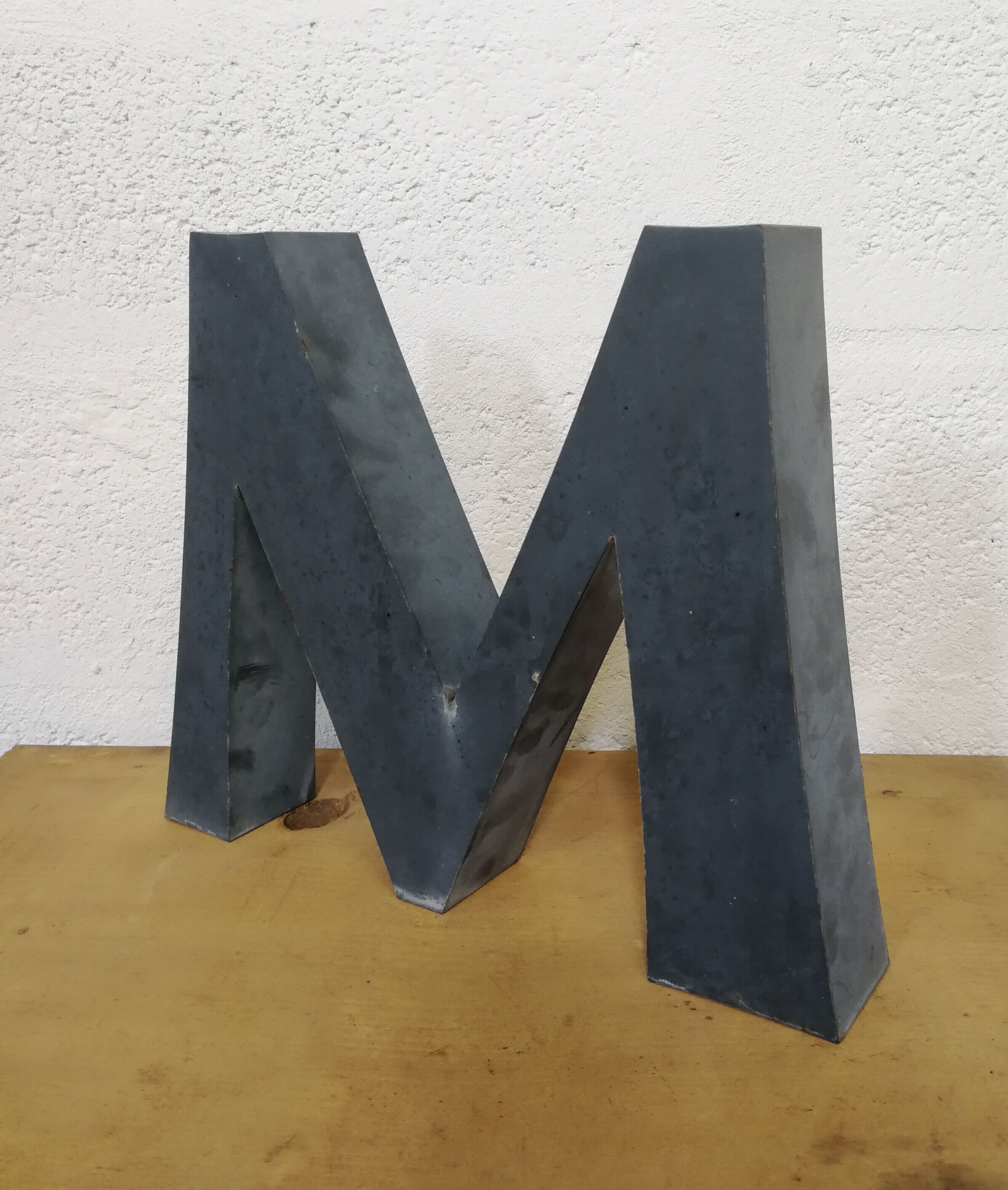 Letter M old embossed and zinc