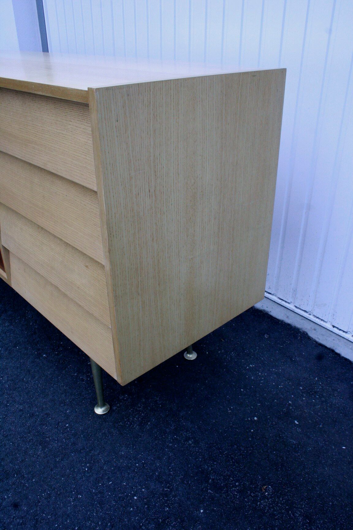 Midcentury sideboard with brass legs
