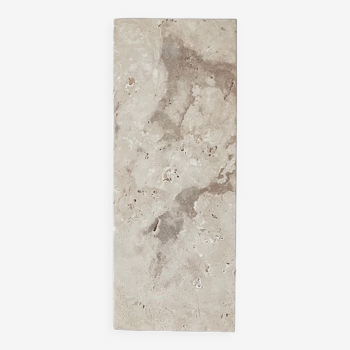 Travertine stele