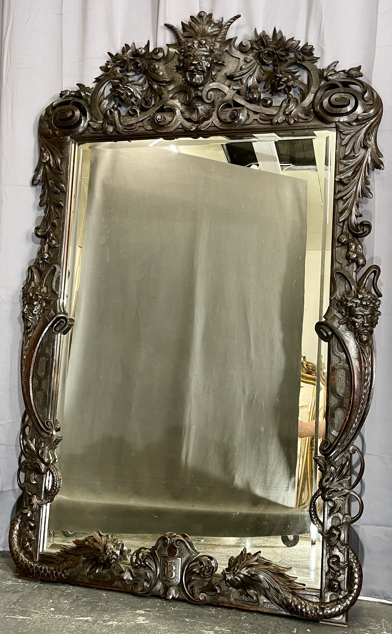 Mirror 191x122 cm period XIXth in natural wood, decoration of chimeras, satyrs