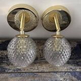 Pair of chiseled globe wall lights
