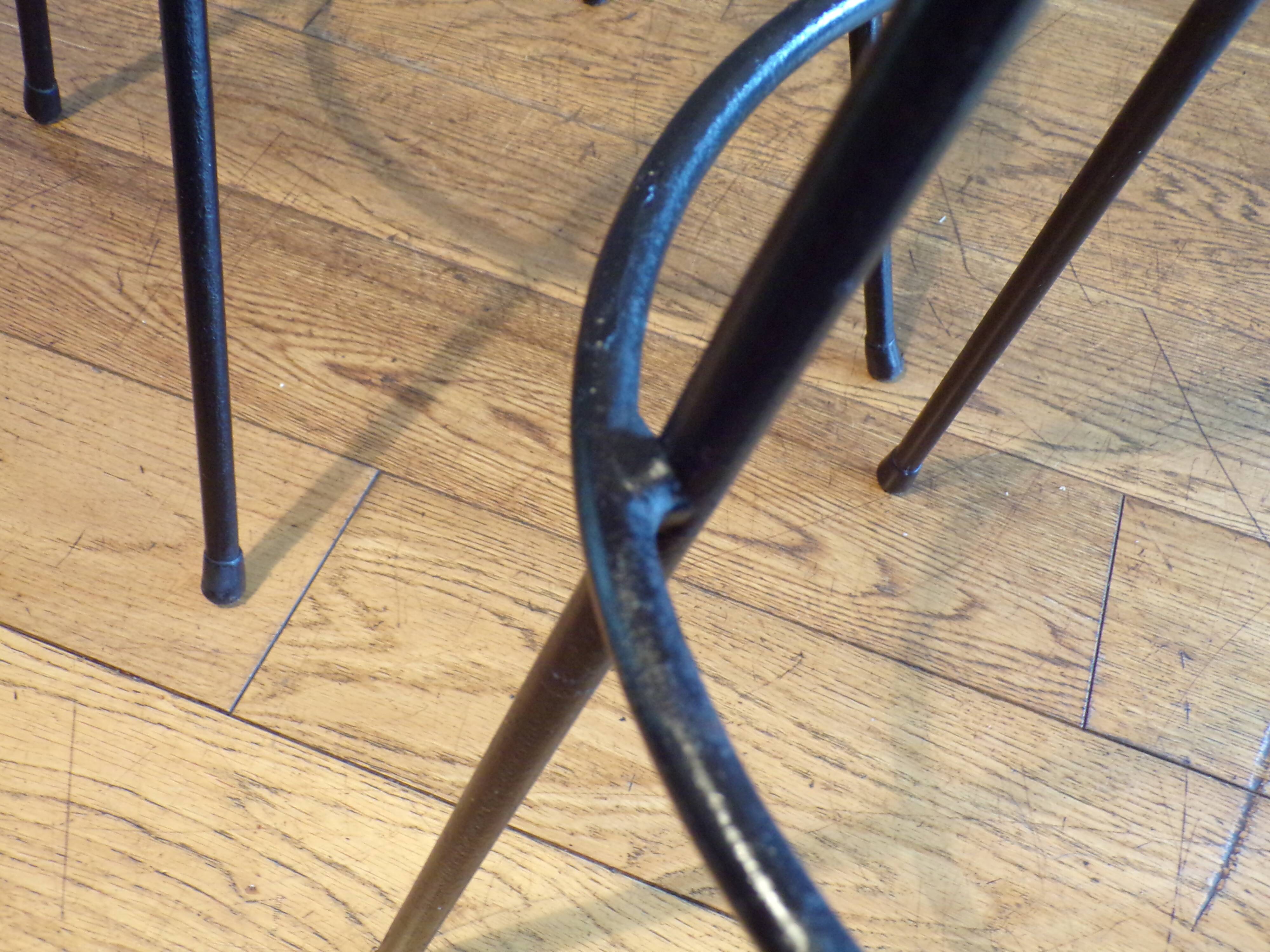 Pair of 1950s iron and rattan bar stools