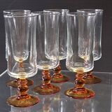 6 amber-footed champagne flutes in very good condition.