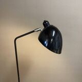 Black metal tripod floor lamp
