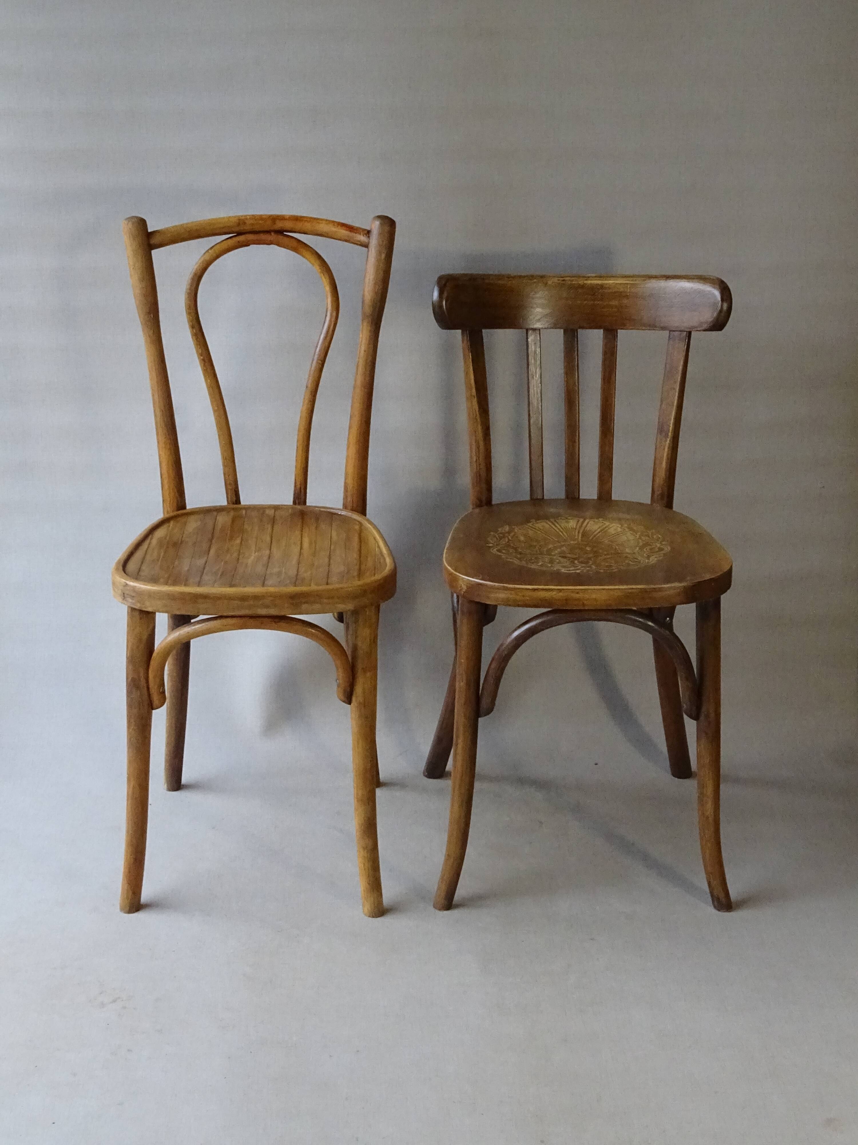Set of 36 mismatched Bistrot chairs, 1920 to 1950, wooden seats.
