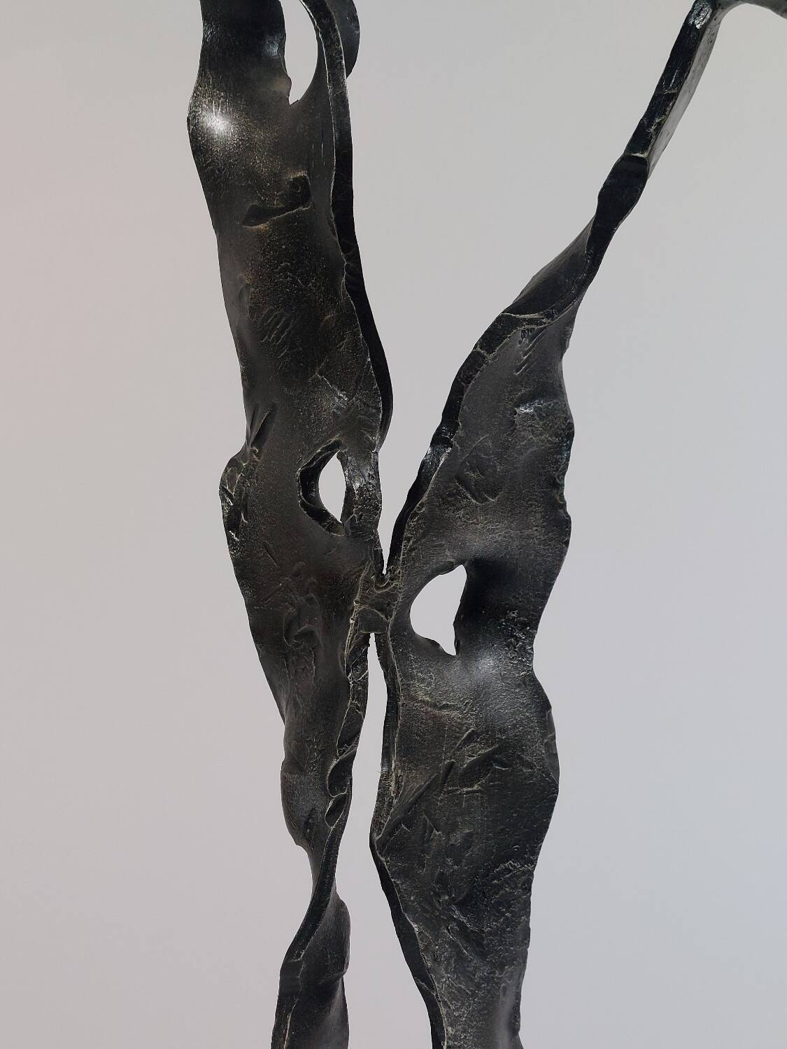 Sculptural brutalist floor candle holder made of hand-forged iron from the 1950s.